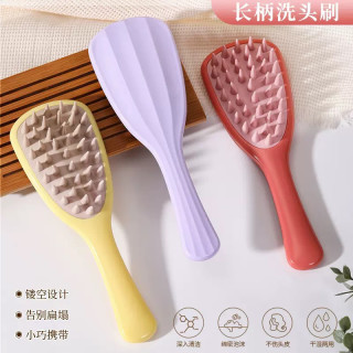 粗齿长柄硅胶洗头刷家用头皮按摩清洁止痒顺发硅胶梳子
