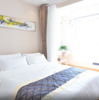 特价酒店：青岛途家斯维登度假公寓 市景双卧套房