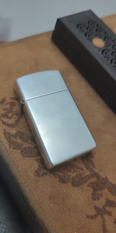 
对于Zippo打火机爱好者，纤巧机很适