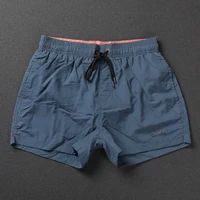 在礼夏季休闲运动短裤三分裤男生纯色简约基础款速干可下水沙滩裤度假 孔雀蓝 3XL