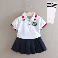 吉卡龙夏季幼儿园园服小学生校服儿童英伦风班服短袖运动套装毕业照服装 女/白polo衫+藏蓝短裙+白袜 13#(120cm)