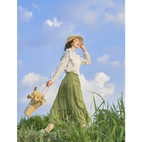 茵曼（INMAN）莱赛尔苎麻半身裙2023秋女装松紧腰不对称裙摆遮胯裙子 草芥绿 L