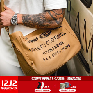 马登 美式复古大容量斜挎报童包字母帆布机车电脑托特邮差包男 杏黄 均码