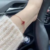 清仓特价镀18K金四叶草手链女Au750玫瑰金彩金送