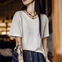 马登 夏日象牙白小心机微透短袖