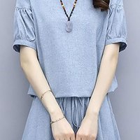 子牧棉麻2025夏装 女时尚两件套遮肚子显瘦半身裙短袖套装裙子5812 浅绿色 M (95-115斤)
