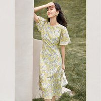 对白法式浪漫碎花连衣裙女2025夏季新款气质花苞袖度假风百褶长裙
