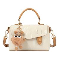 啄木鸟(TUCANO)包包女包时尚撞色斜挎包波浪纹理邮差包百搭手提单肩包轻奢