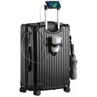 梵地亚26英寸带杯架手机支架USB充电行李箱男女拉杆箱旅行箱密码箱子黑 26英寸 .中长途出行.干湿分离内里