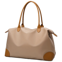 通勤托特包女高级感手提旅行饺子包防水单肩大容量妈咪包