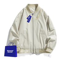 WASSUP HERMU潮牌联名夹克男女秋春春季美式痞帅棒球服宽松大码飞行服外套 米白色 XL（150-170斤）