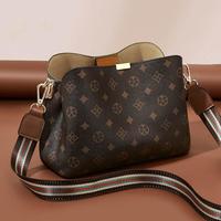 金狐狸 包包女2024年轻奢女包单肩斜挎包手机包水桶包时尚大容量