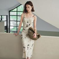 摩凡 夏新款优雅浪漫印花A字吊带裙连衣裙