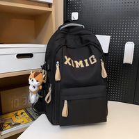 瑞士军刀（SWISSGEAR）书包男大大容量高中初中生时尚百搭潮牌双肩包女背包ins尼龙 黑色双肩包+挂件