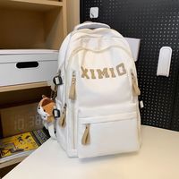 瑞士军刀（SWISSGEAR）书包男大大容量高中初中生时尚百搭潮牌双肩包女背包ins尼龙 白色双肩包+挂件