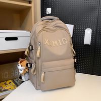 瑞士军刀（SWISSGEAR）书包男大大容量高中初中生时尚百搭潮牌双肩包女背包ins尼龙 卡其色双肩包+挂件