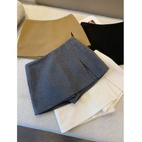 冬媛 时尚设计感双层开叉毛呢半身裙女秋冬款高腰显瘦防走光A字包臀裙