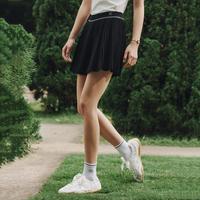 FILA 女装网球半截裙女士时尚学院风基础百搭简约微弹舒适梭织百褶裙