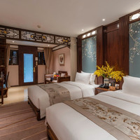 移动端:丽江多弗度假酒店2晚+欢迎水果+民族风小挂饰+非遗甲马拓印体验1次+1份双人腊排骨火锅
