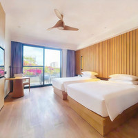 移动端：三亚东融嘉宾国际酒店2晚+入住尊享一次旅拍服务+每日迷你吧一份+呀诺达景区(门票&车票)8折优惠+酒店至大东海沙滩...