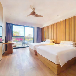 三亚东融嘉宾国际酒店2晚+入住尊享一次旅拍服务+每日迷你吧一份+呀诺达景区(门票&车票)8折优惠+酒店至大东海沙滩...