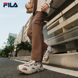FILA 易烊千玺同款梭织长裤2025秋季新款时尚休闲舒适伞兵裤男 深土色-BN M 170/80A/M