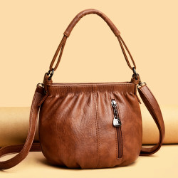 复古包包女2024新款竖款软面椭圆时尚中年斜跨小圆包休闲女士包包
