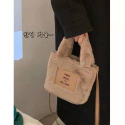 毛毛包女2021冬新款ins手提斜挎包大容量时尚小众毛绒包包水桶包