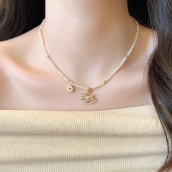铜合金仿珍珠项链 金色闪锆小马珍珠项链女轻奢小众毛衣链锁骨链