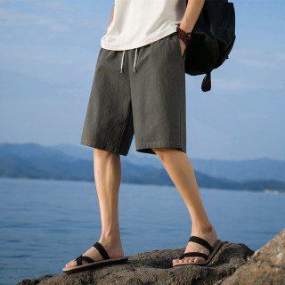 月伊纺 夏季新款棉麻五分裤男宽松直筒休闲短裤青年运动沙滩裤大裤衩裤子 绿色 2XL