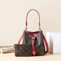 COACH 【老花子母】ROWAN 21斜挎水桶包